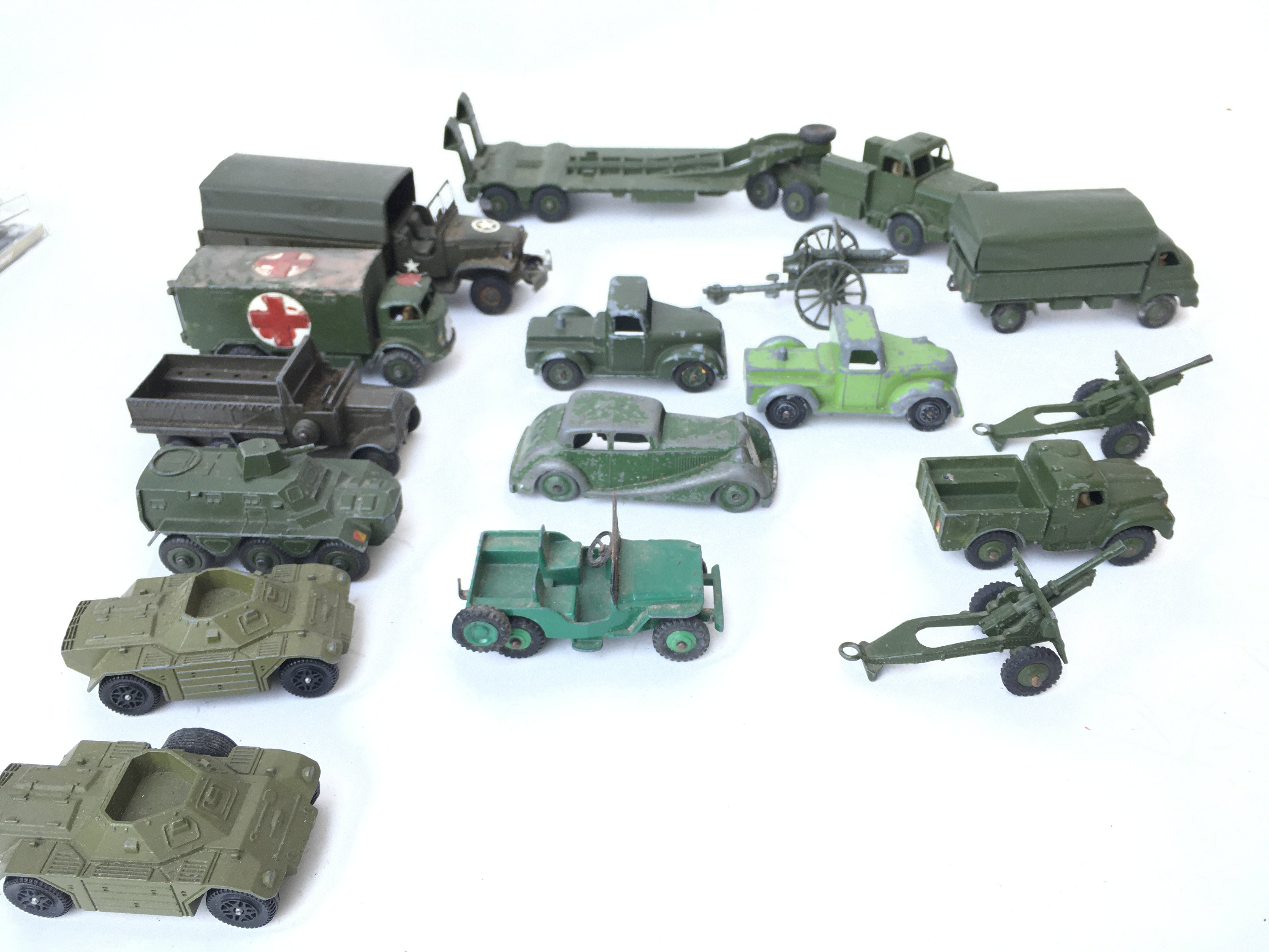 A Box Containing a Collection of Military Vehicles