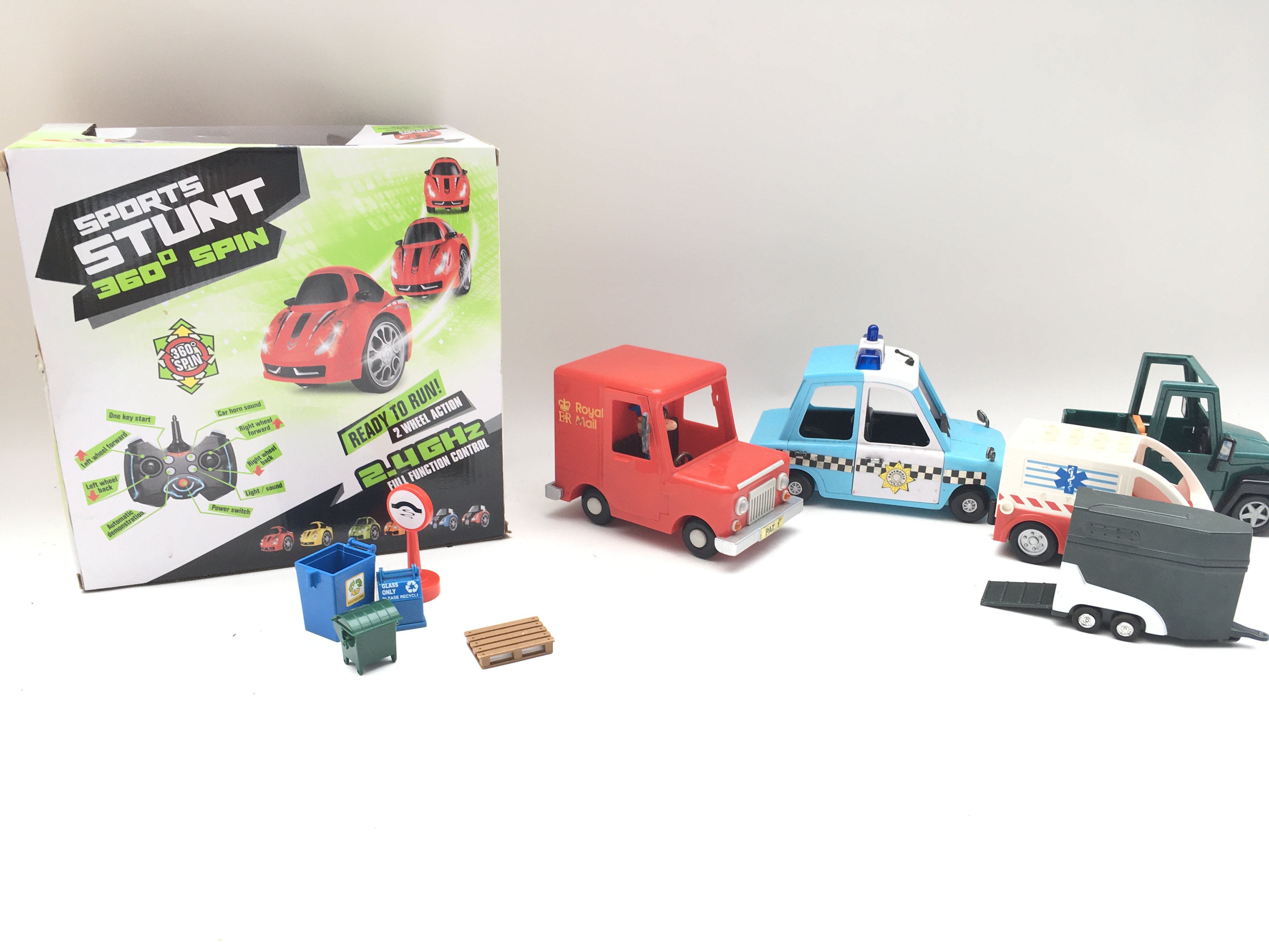 Collection of postman pat vehicles and figures. Boxed RC stunt car. - Image 3 of 3