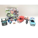 Collection of postman pat vehicles and figures. Boxed RC stunt car.