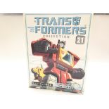 A Boxed Takara Transformers #21 Broadcast.