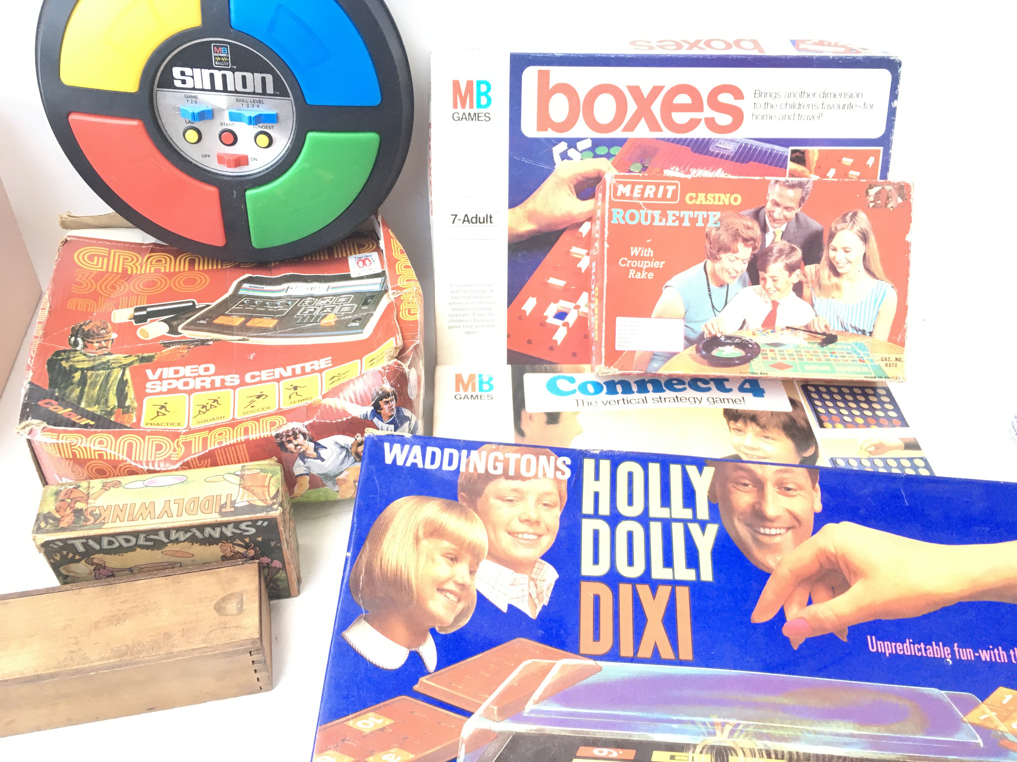 A Collection of Board games and electronic Games including Granstand 3600. Holly Dolly.Battleships