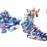 A box Containing Loose power Rangers Including Mystic Force. Mega Zords.etc.