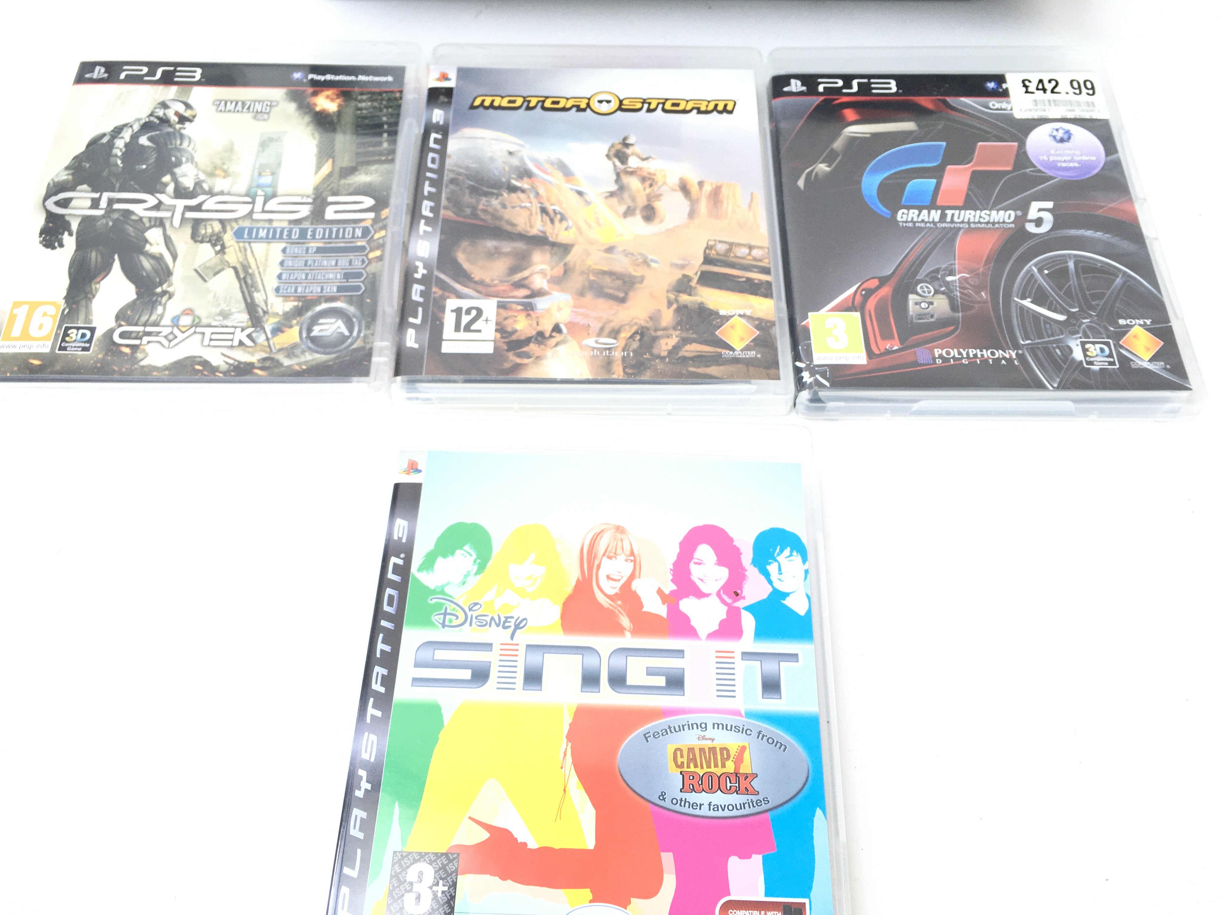 A Sony PlayStation 3 with a Collection of Games. - Image 4 of 4