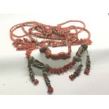 A collection of antique and vintage coral necklace