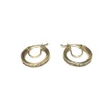 Yellow gold stone set hoops.