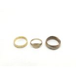 Three gold rings, approx total weight 8.3g.