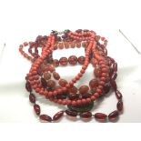 A collection of amber and other vintage bead neckl