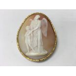 A Victorian cameo depicting cherub and figures in
