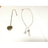 9ct locket and two chains. 5.66 grams.