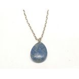 A 9ct gold belcher chain with attached blue stone