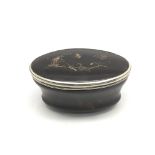 A Georgian tortoiseshell and silver snuff box.