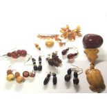 A collection of Vintage butterscotch amber and red