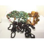 A collection of amber and other polished stone and