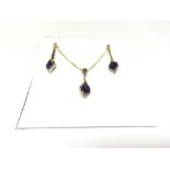 An amethyst and diamond suite consisting of earrin