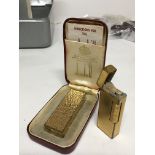 Two Vintage Dunhill lighters one in a fitted box with paperwork (2) used worn condition - NO