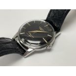 A vintage Longines black dial flagship model gents