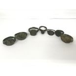 A large collection of ancient bronze Roman rings all as pictured, some bearing insignias.