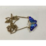 A 9ct gold and enamel butterfly necklace.
