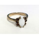 A 9ct gold Opal and garnet cluster ring - NO RESERVE