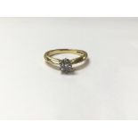 An 18ct gold ring set with 0.25ct diamond. The approximate ring size is K.