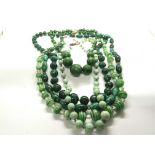 A collection of Vintage green malachite and other
