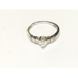 An 18ct white gold fancy marquise diamond set ring