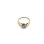 An 18ct gold solitaire diamond ring, approx .25 po