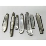 A Collection of 7 penknifes including silver.