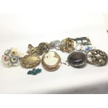 A collection of antique and Vintage brooch earring