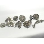 A collection of antique and other novelty silver b