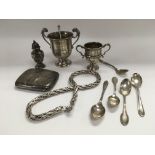A collection of silver cups and other silver items