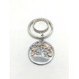A silver and gold Clogau key ring and ring (2).