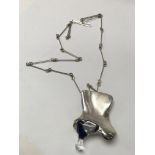 A silver necklace by maker Bjorn Westrom made by Lapponia, Finland in 1970s