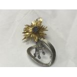 An unmarked flower brooch of Edwardian style