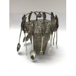 A pretty silver plated filigree basket with a collection of hanging silver plated spoons and forks -