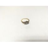 18ct gold three stone ring. Size M.