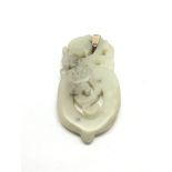 A carved jade pendant, approx length 6.5cm.