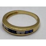 An 18ct sapphire and diamond 10 stone half eternity ring.