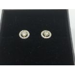 A boxed pair of 18ct yellow and white gold diamond