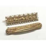 Two gold bar brooches one marked 15ct the other wi