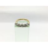 An 18ct gold five stone diamond ring, RBC diamonds