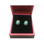 A pair of 9ct gold and turquoise earrings, approx