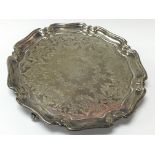 A hallmarked silver card tray, weighing approximately 166g.