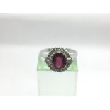 A certificated 18ct white gold, ruby and diamond c