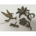Four silver and marcasite brooches including two f