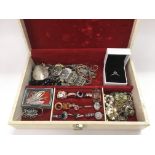 A jewellery box of silver and other jewellery item