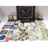 A collection of coins and bank notes including pro