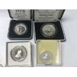 Four silver cased coins, including 1994 Barbados dollar, 1998 Montserrat, royal Wedding of Prince