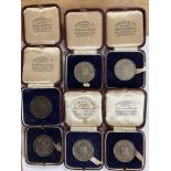 A collection of hallmarked silver and bronze cased