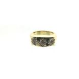 A gents 9ct gold three stone diamond gypsy style r